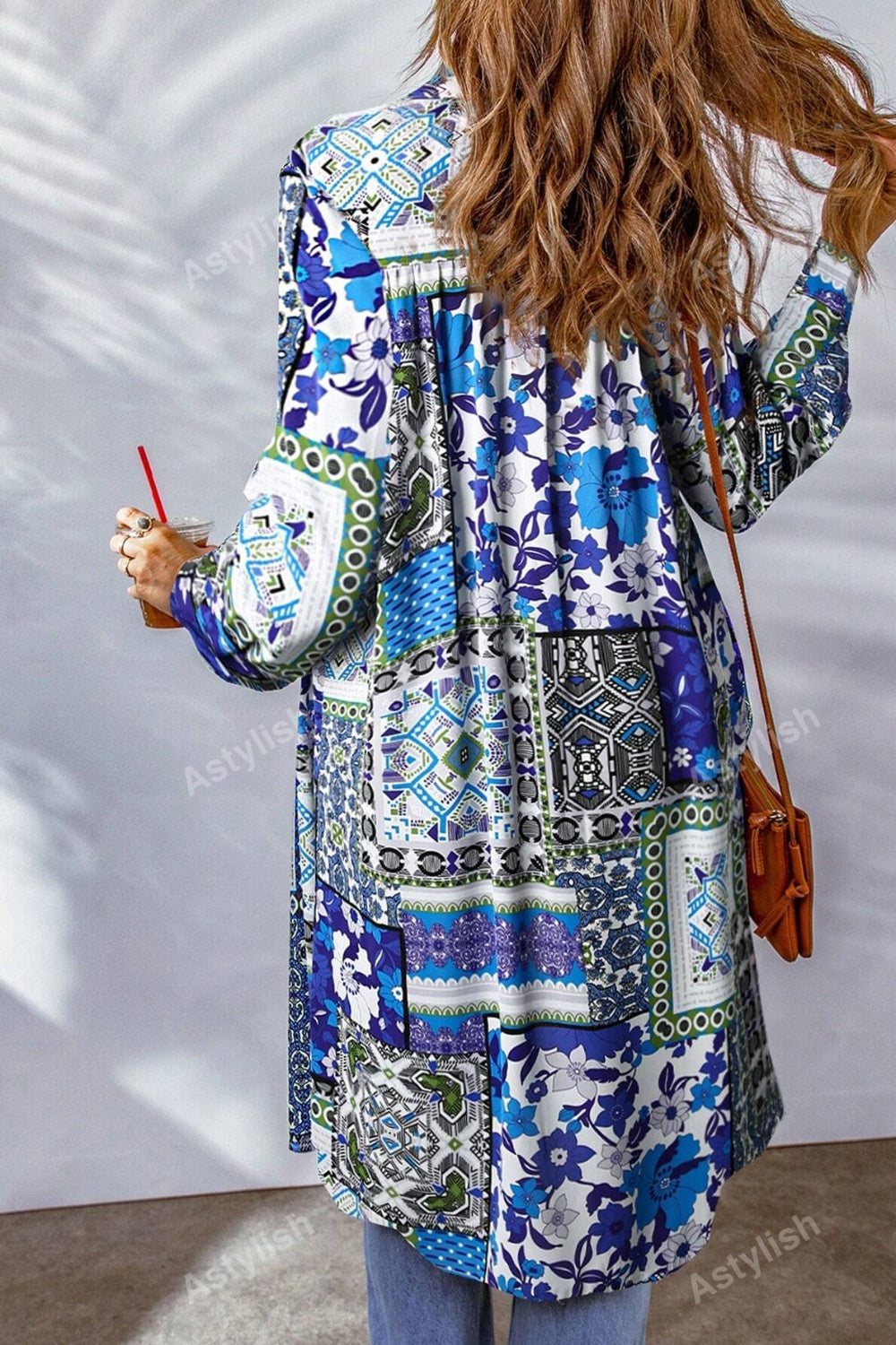 Patchwork print duster shirt jacket in Royal Blue with button front and long sleeves.