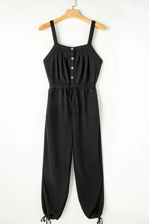Black waffle knit wide leg jumpsuit with button front and drawstring waist