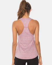 Blush pink heathered racerback performance tank top with a subtle seam detail on the back.