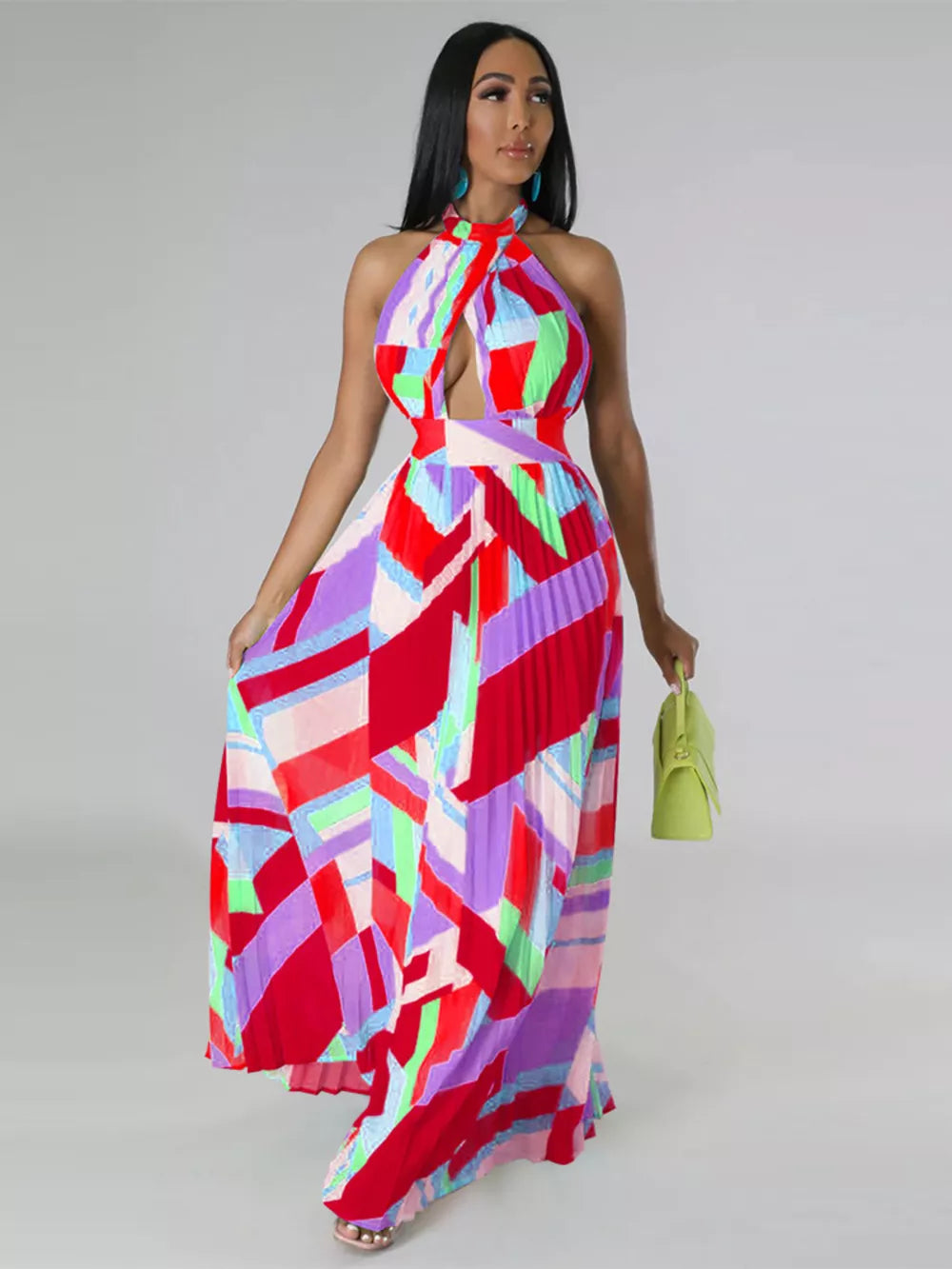 Halter neck pleated maxi dress with bold geometric print and defined waistband.