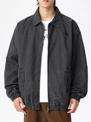 Men's dark gray casual zip jacket with elastic cuffs and hem, collared neckline.
