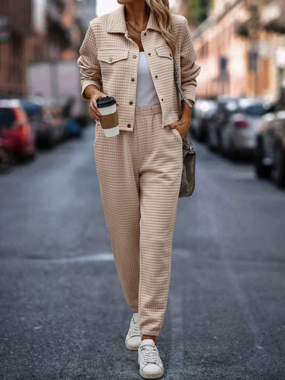Quilted co-ord set in tan, featuring a button-up jacket with pockets and matching joggers.