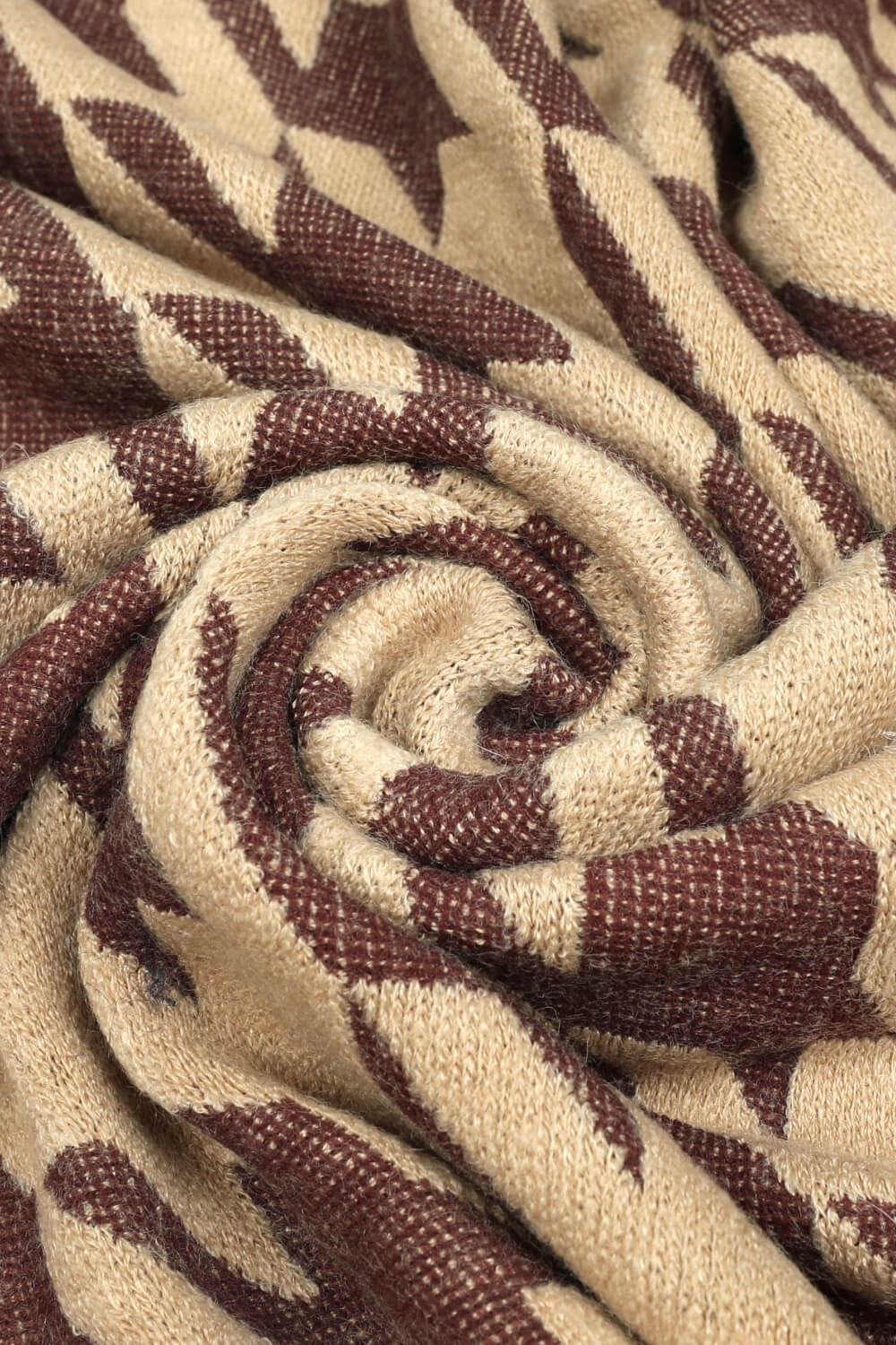 Houndstooth faux fur collar poncho in beige with brown pattern detail.