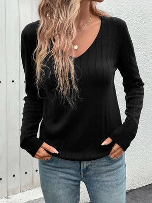 Black ribbed V-neck sweater with long sleeves and a relaxed fit.