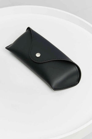 Black faux leather sunglasses case with snap closure