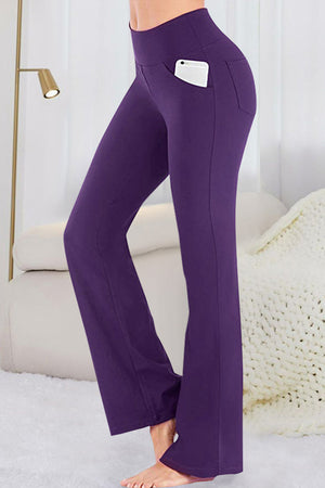 Violet flare-leg performance trousers with side pockets and a phone.