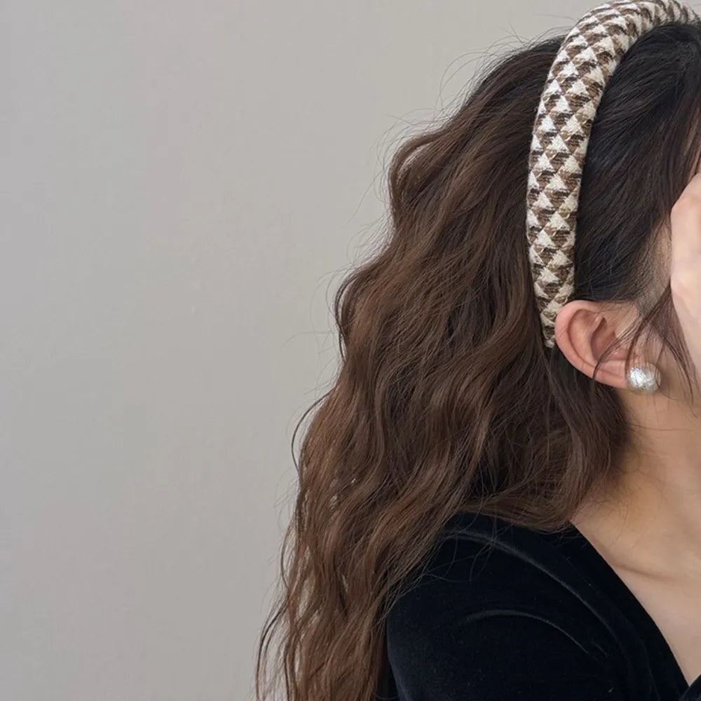 Textured tweed padded headband with geometric pattern in coffee brown and white.