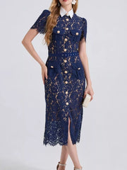 Elegant navy lace midi dress with white collar, button front, pockets, and short sleeves.