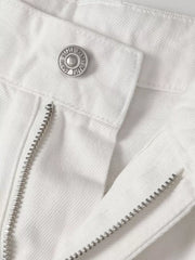 White relaxed fit wide leg sweatpants with silver button and zipper detail.