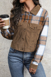 Brown corduroy jacket with plaid patchwork sleeves and chest pockets.