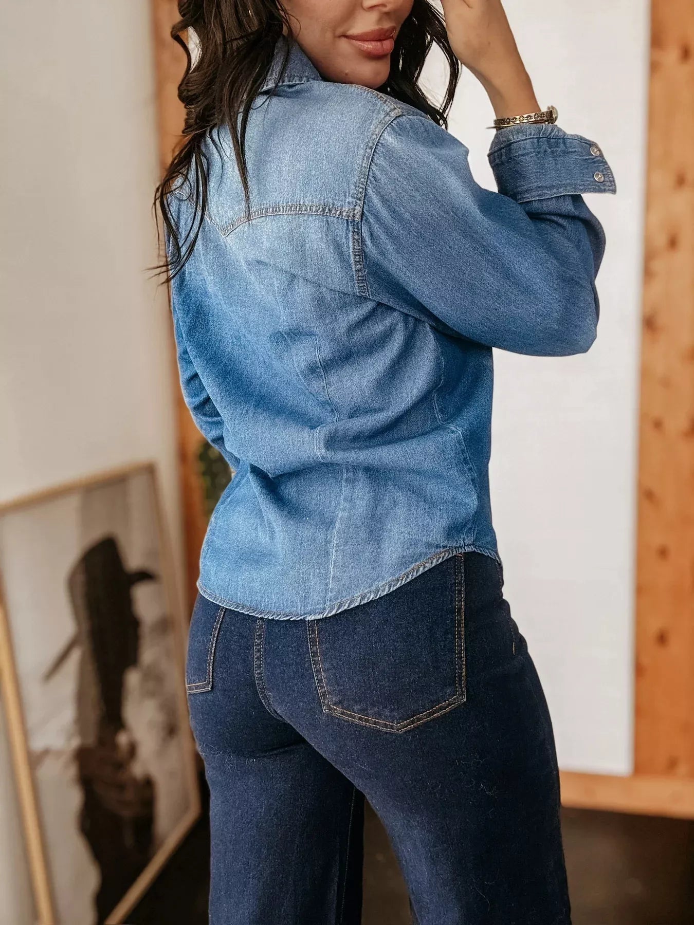 Classic blue denim button-down shirt with a cotton blend, shown from the back.