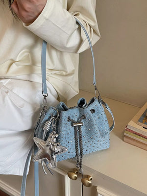 Drawstring Bucket Crossbody Bag in Blue, close-up detail