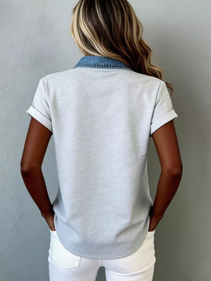 Heathered light gray short sleeve maternity shirt with denim collar and cuffs.