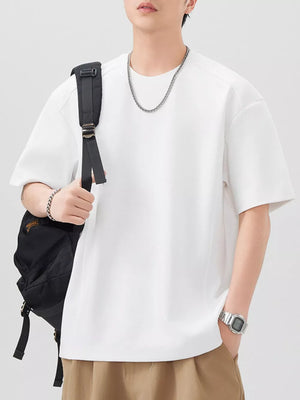 Oversized off-white cotton blend men's t-shirt with crew neck and short sleeves.