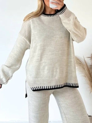 Beige relaxed fit sweater set with contrast black trim on neckline and hem