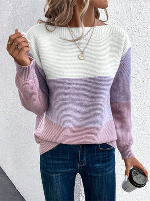 Colorblock boatneck knit sweater in white, lavender, and pink stripes.