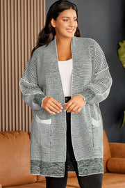 Textured knit cocoon cardigan in Cloudy Blue with pockets and open front.