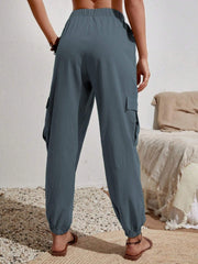 Textured cargo lounge trousers in Dusty Blue with elasticated cuffs and patch pockets.
