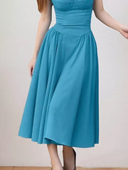 Cerulean sweetheart midi dress with spaghetti straps and full skirt
