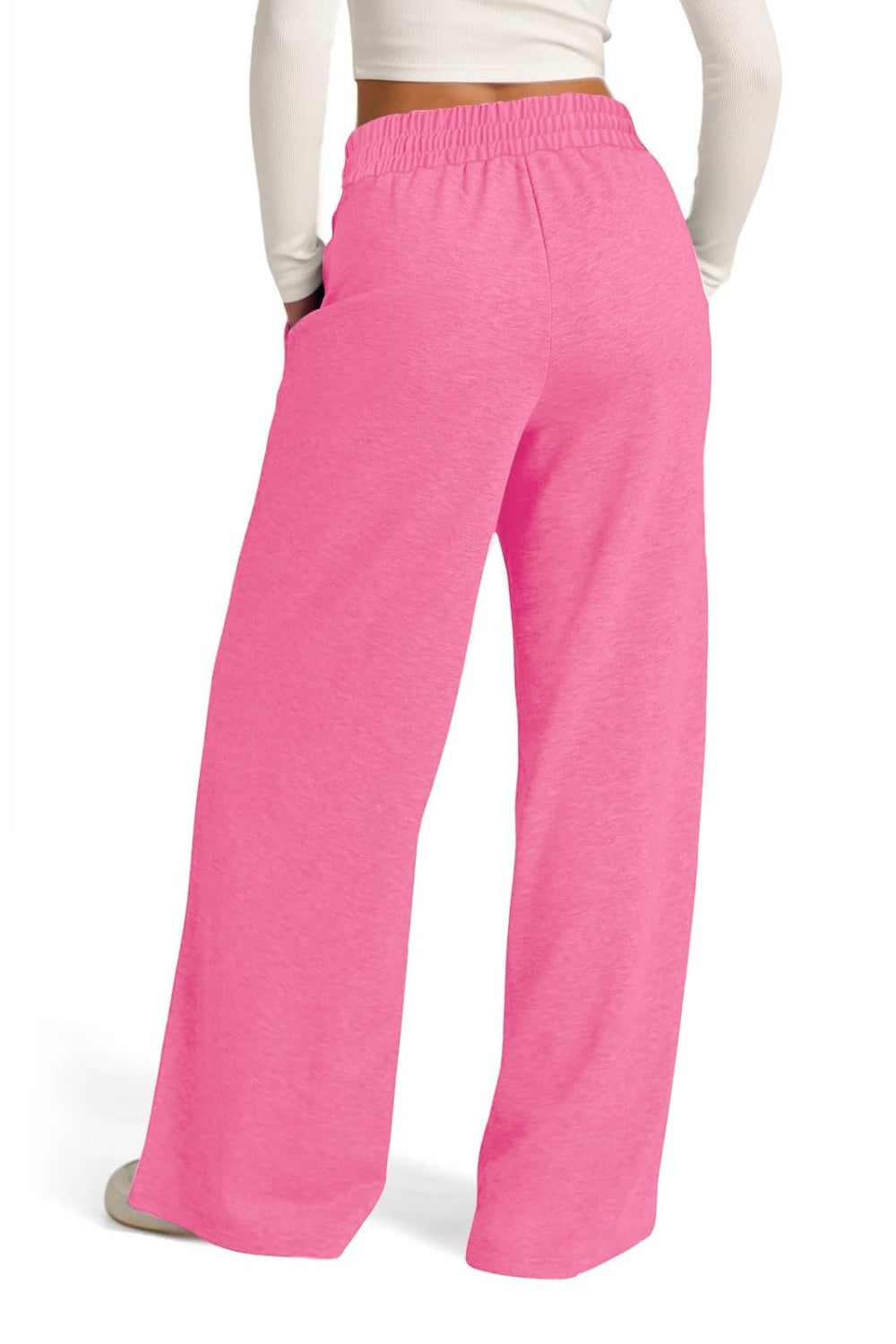 Seamed palazzo lounge trousers in bright pink with a wide leg and elastic waistband.
