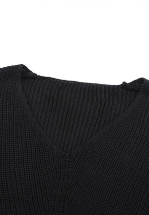 Black relaxed knit V-neck pullover sweater with ribbed texture.