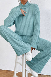 Aqua ribbed knit turtleneck lounge set with wide leg pants.