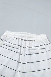 White striped bikini bottoms with drawstring waist and back pockets.