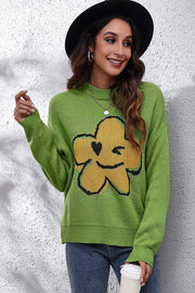 Yellow-green acrylic sweater with a smiley flower intarsia knit design and crew neck.