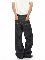 Loose fit dark wash denim jeans with embroidered musical notes on back pockets.