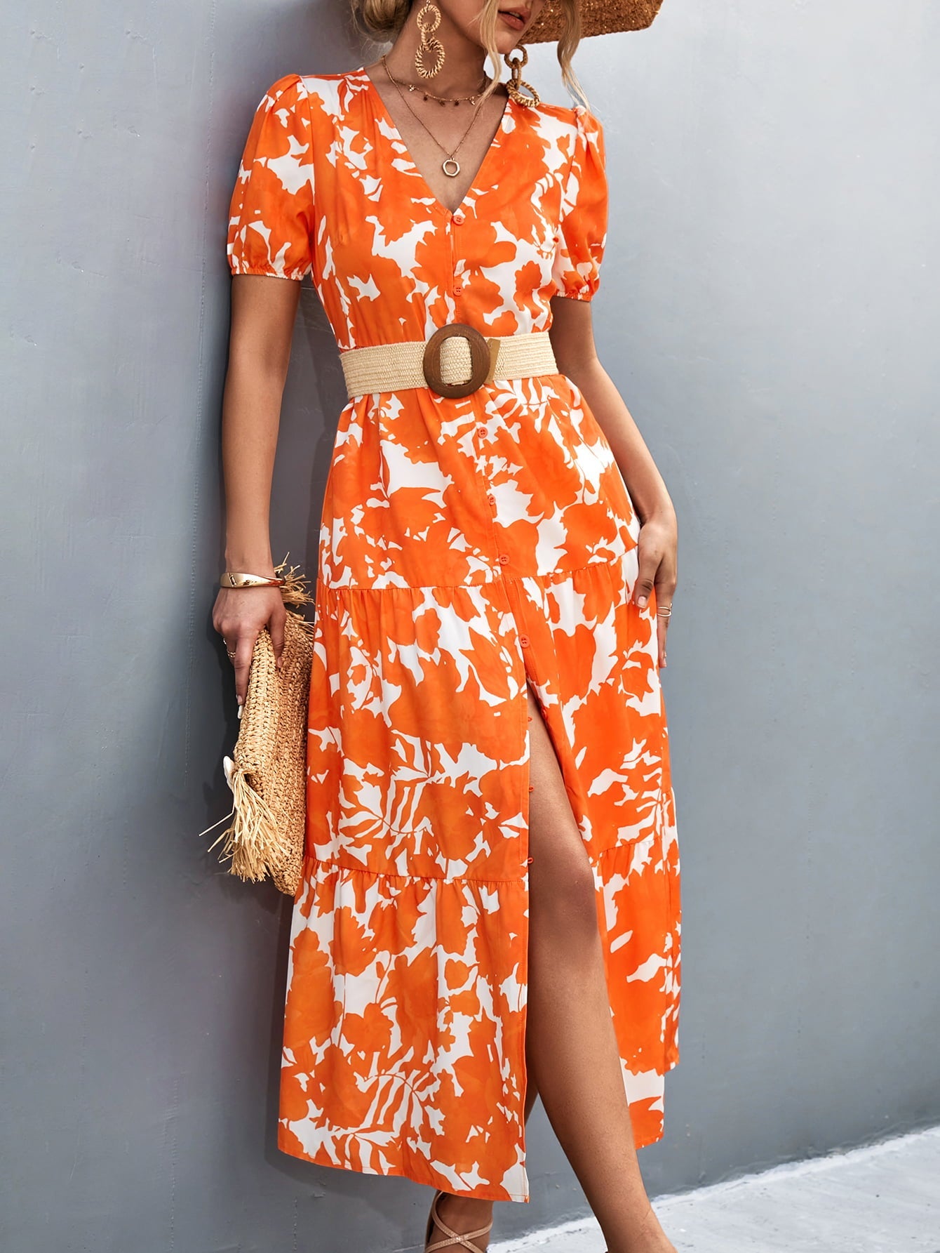 Orange-red floral print midi dress with puff sleeves and a high slit.