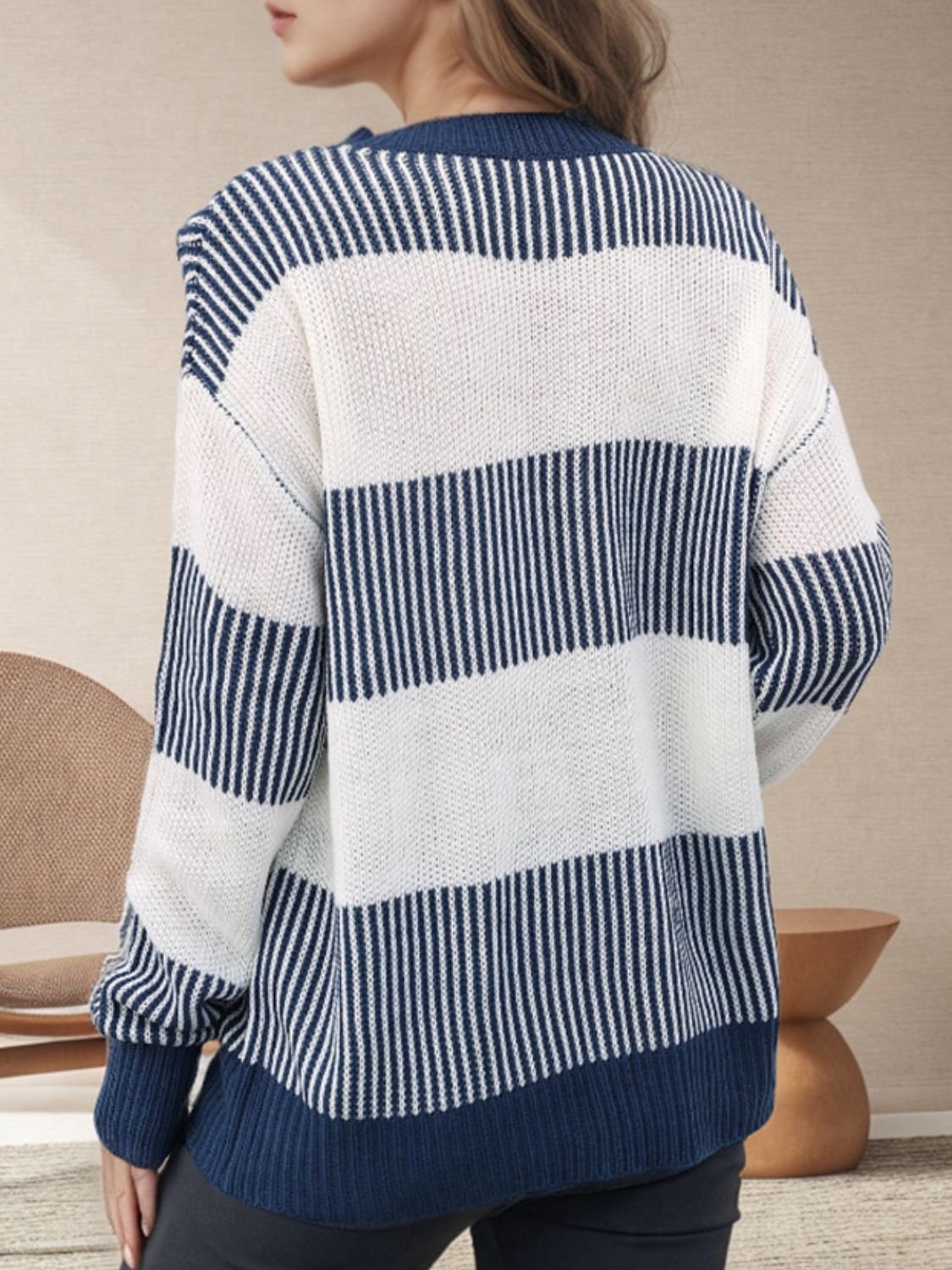 Nautical stripe knit crewneck sweater in dark navy and white, featuring a relaxed fit and ribbed cuffs.