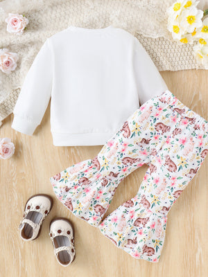 Baby girls' white crew neck sweatshirt and bell bottom pants with a bunny and floral print.