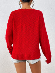 Deep Red acrylic knit sweater with crew neck and side slits, styled with denim shorts.