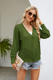 Green openwork knit button-down cardigan with V-neck and long sleeves.
