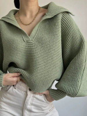 Army green knit sweater with wide collar and balloon sleeves.