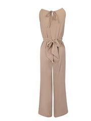 Beige halter neck wide leg jumpsuit with drawstring waist tie and back tie detail.