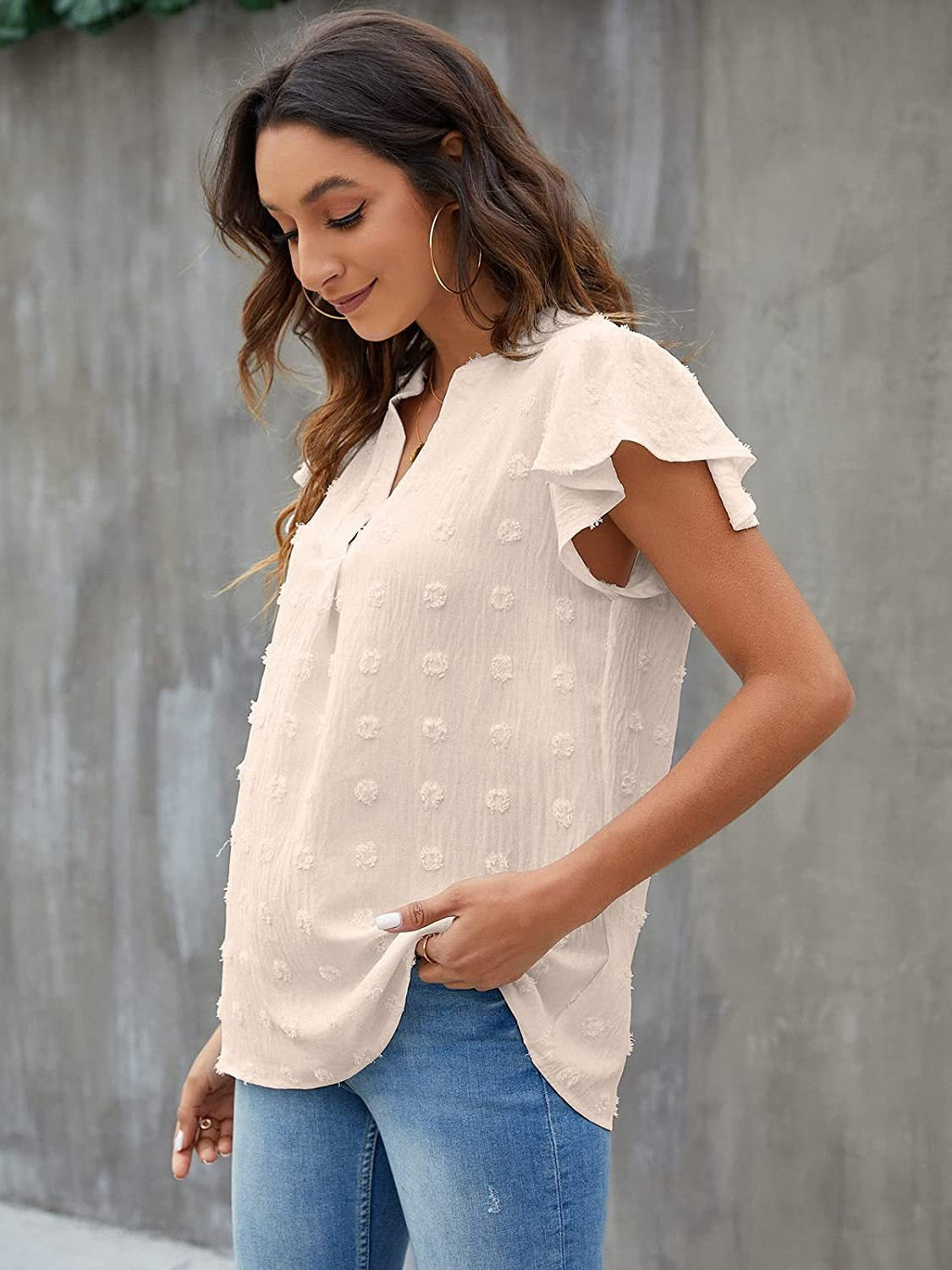 White textured voile blouse with flutter sleeves and a v-neckline