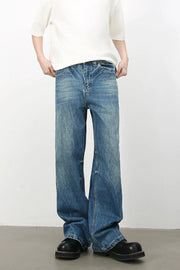 Baggy denim jeans in medium vintage wash with classic cat's whisker detailing.