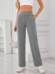 Gray wide-leg lounge trousers with patch pockets and contrast stitching.