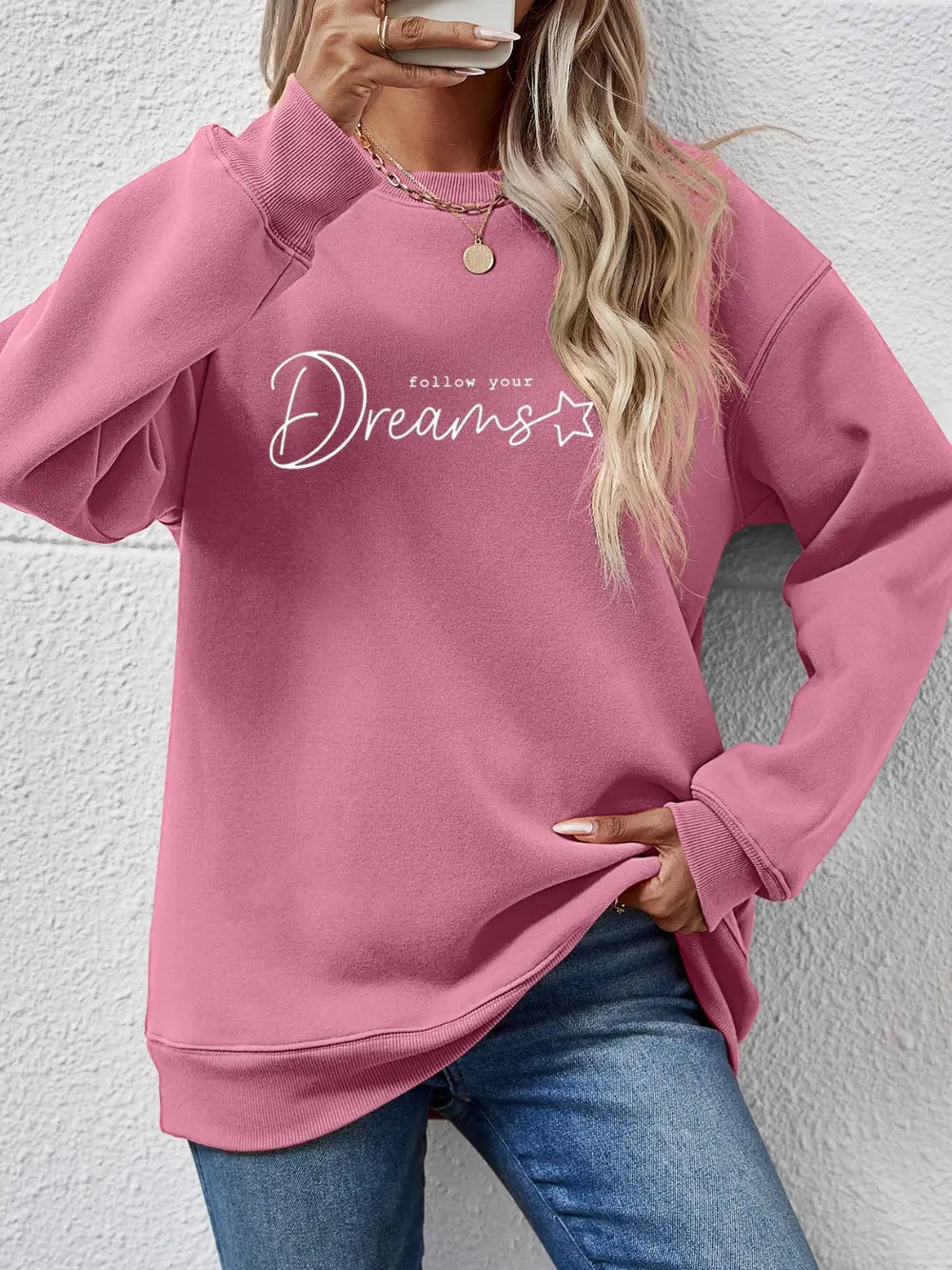 Dreams Scripted Oversized Sweatshirt in Blush Pink with crew neck and long sleeves.