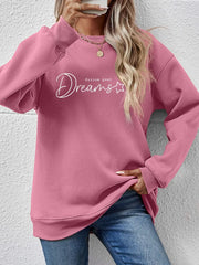 Dreams Scripted Oversized Sweatshirt in Blush Pink with crew neck and long sleeves.