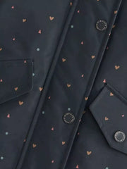 Toddler jacket with allover heart and triangle print, featuring button details and pockets.
