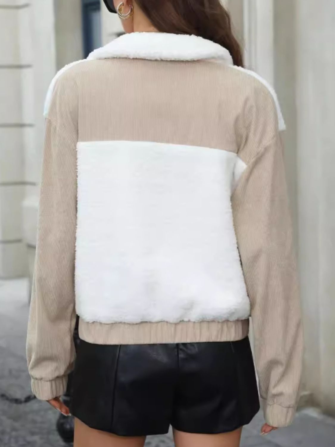 Colorblock corduroy and sherpa zip jacket in white and tan with a sherpa collar.