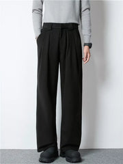 Men's black wide-leg pleated dress pants with a relaxed fit.