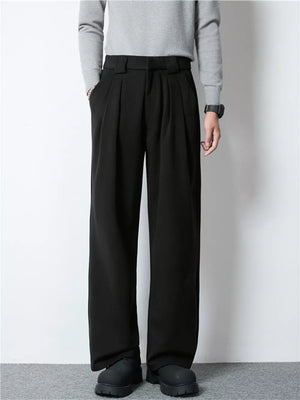 Men's black wide-leg pleated dress pants with a relaxed fit.
