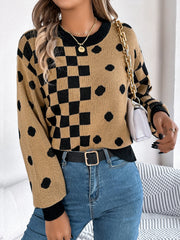 Camel checkerboard and dot intarsia knit sweater with crewneck and long sleeves.