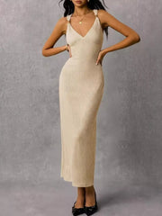 Ivory ribbed midi dress with V-neck and gold ring strap detail.