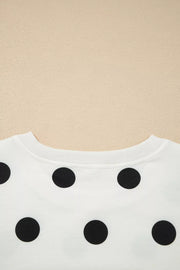 White polka dot two-piece set with ribbed trim neckline