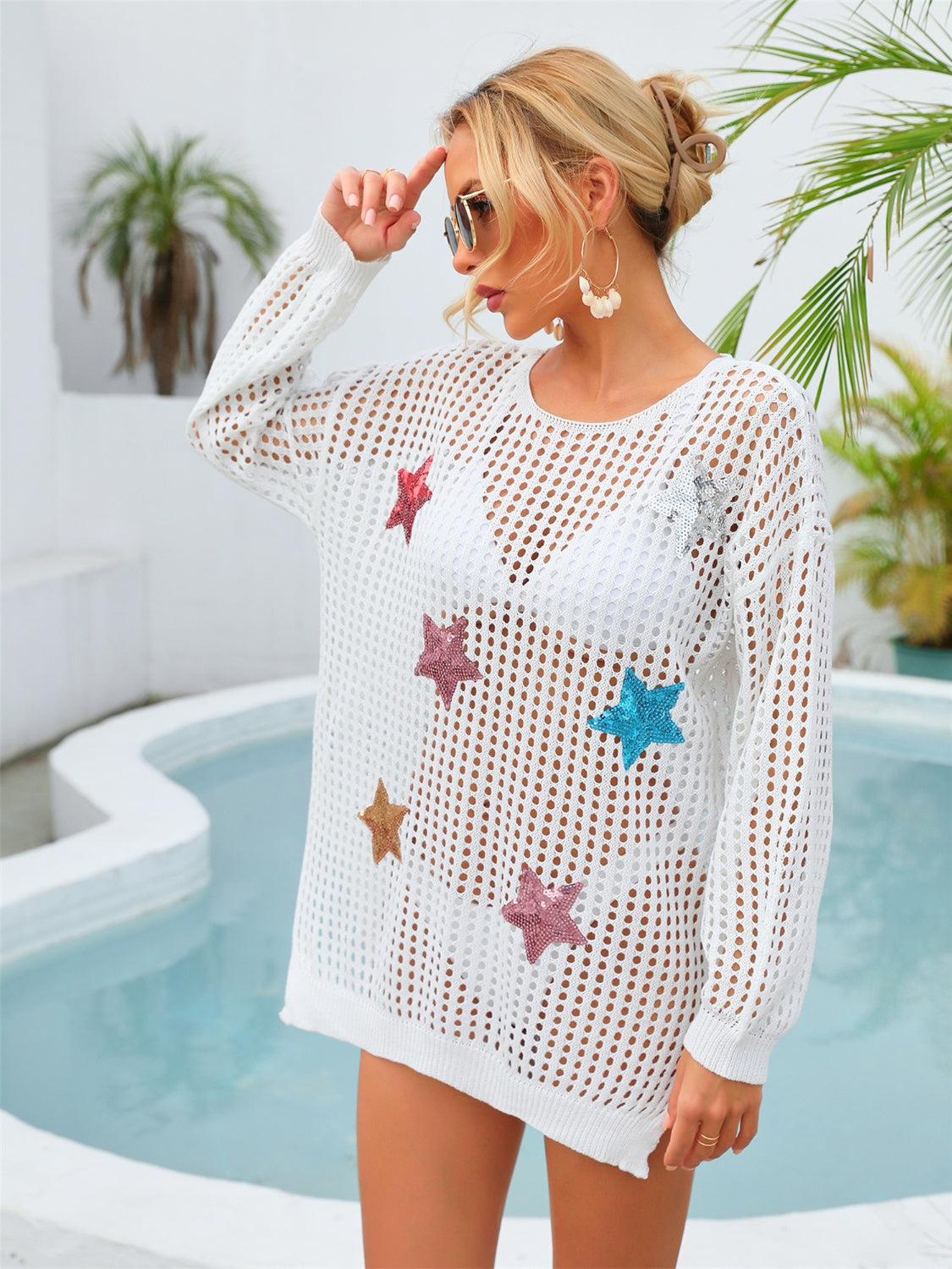 White open knit beach cover-up with sequin stars, long sleeves, crew neck.