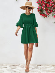 Forest green tiered sleeve tie-waist mini dress with a belted A-line cut.